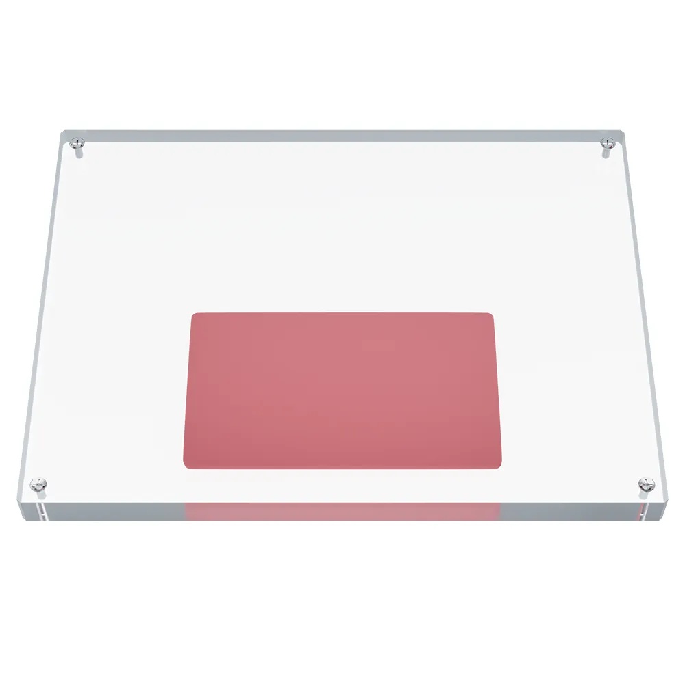 A rectangular transparent plate containing a rectangular red wax insert.