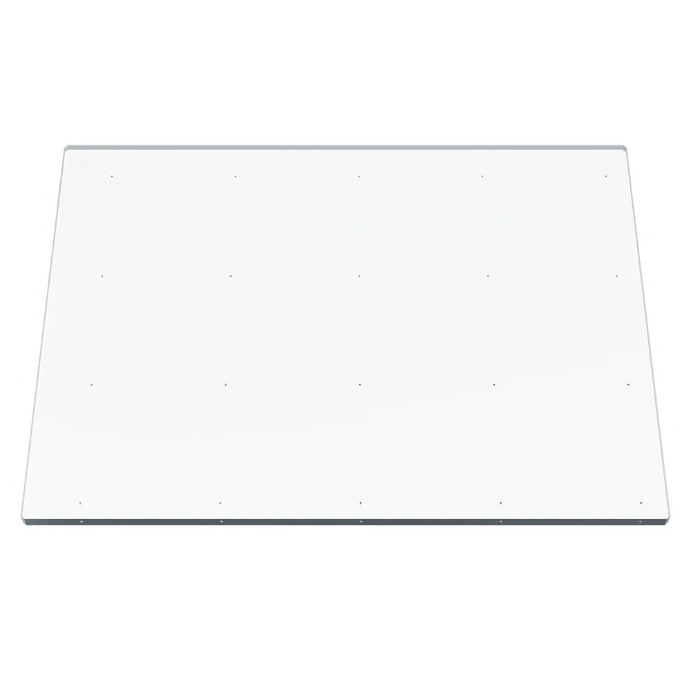 A thin rectangular transparent plate with an array of small aluminim spheres inside.