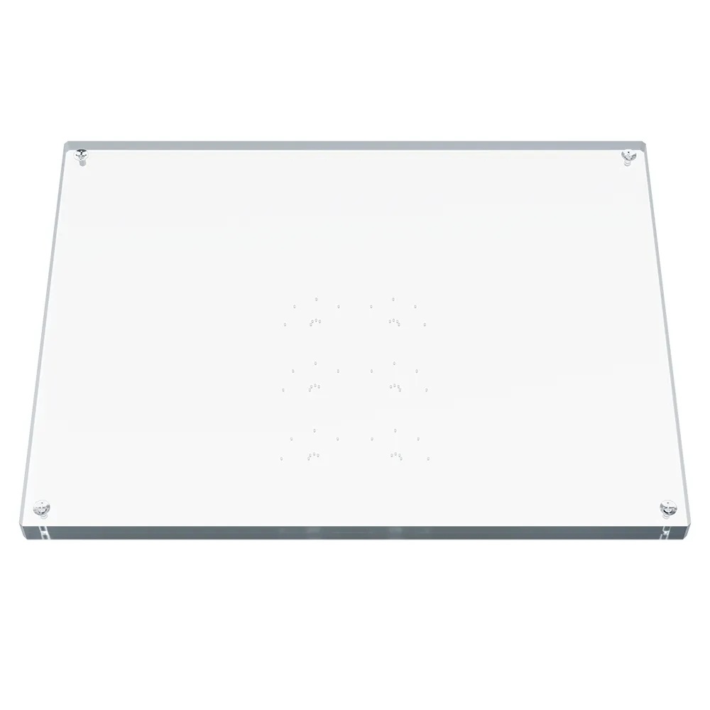 A rectangular transparent plate containing 6 groups of particles arranged in a shape similar to a cat's paw.
