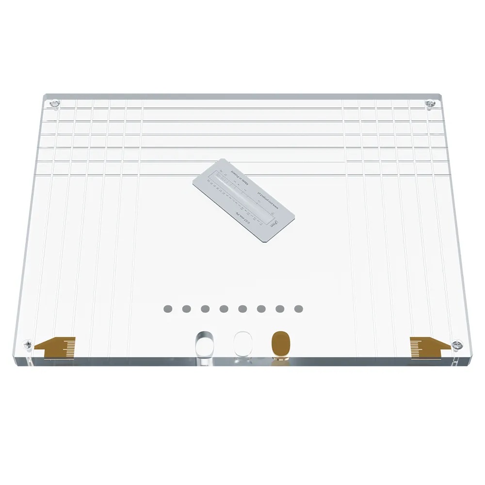 Rectangular transparent plate with engraved grid, hollow elements, copper scales, and resolution plate.