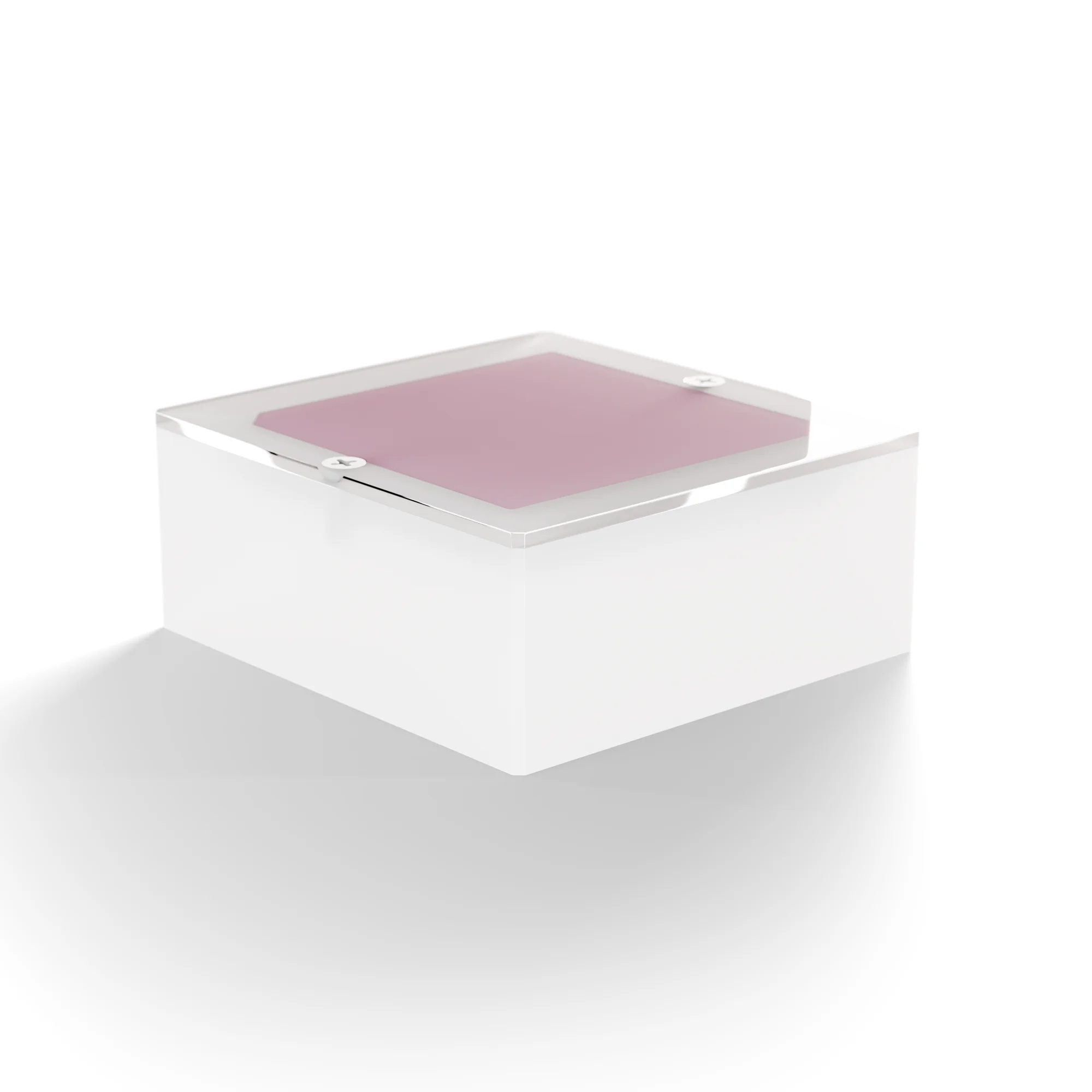 Square object made of sanded transparent plastic with a square flat piece of wax in the middle.