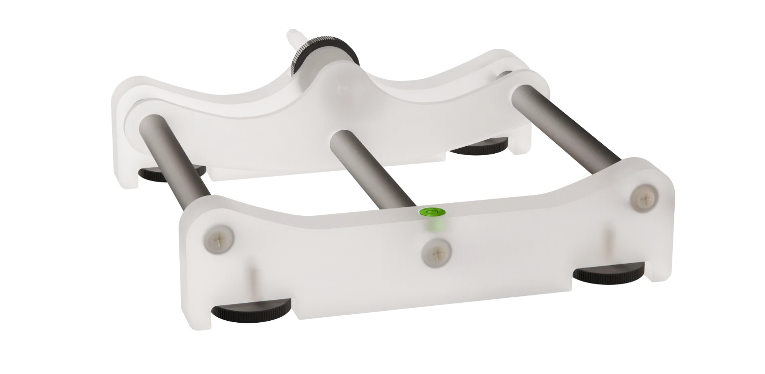 Pro-CT MultiEnergy table stand with adjustable legs, spirit level and screw mechanism for clamping the three phantom sections.