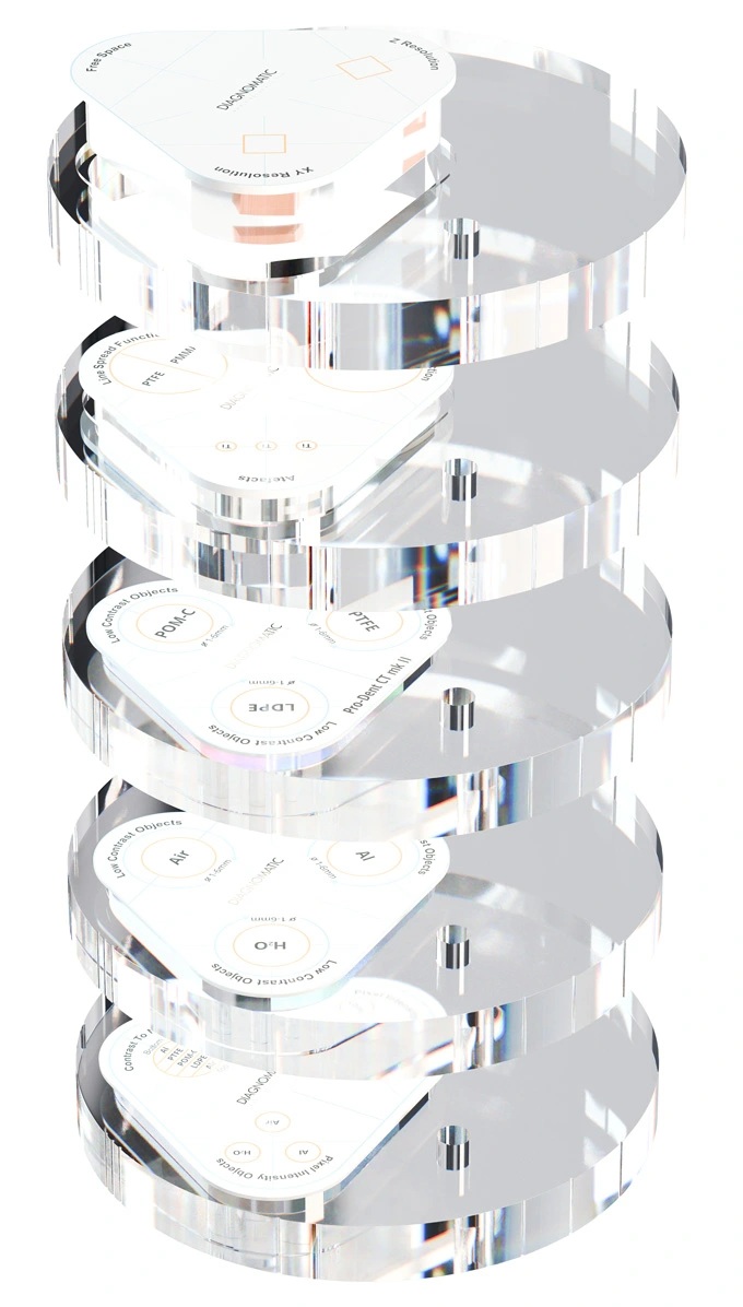 5 acrylic transparent plates stacked one above the other with white triangular inserts with bevelled corners, and printed top surface.