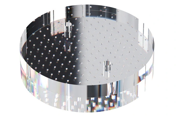 A transparent acrylic round plate with an array of shallow holes uniformly pitched at 10 mm intervals.
