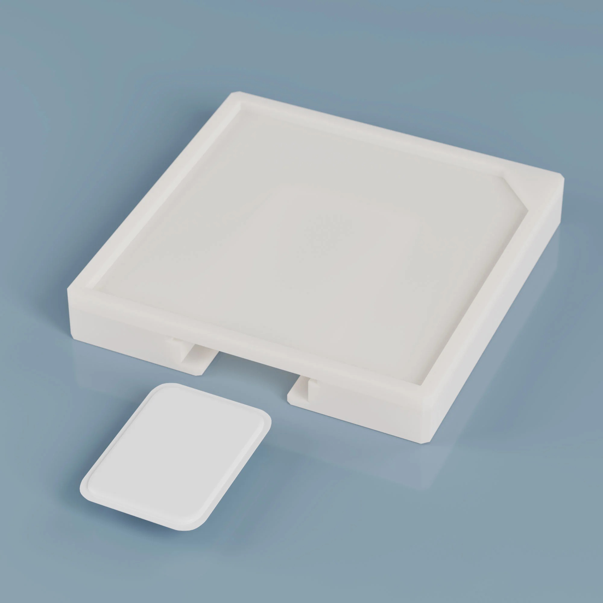 Sliding a small rectangle film to a plastic square base.