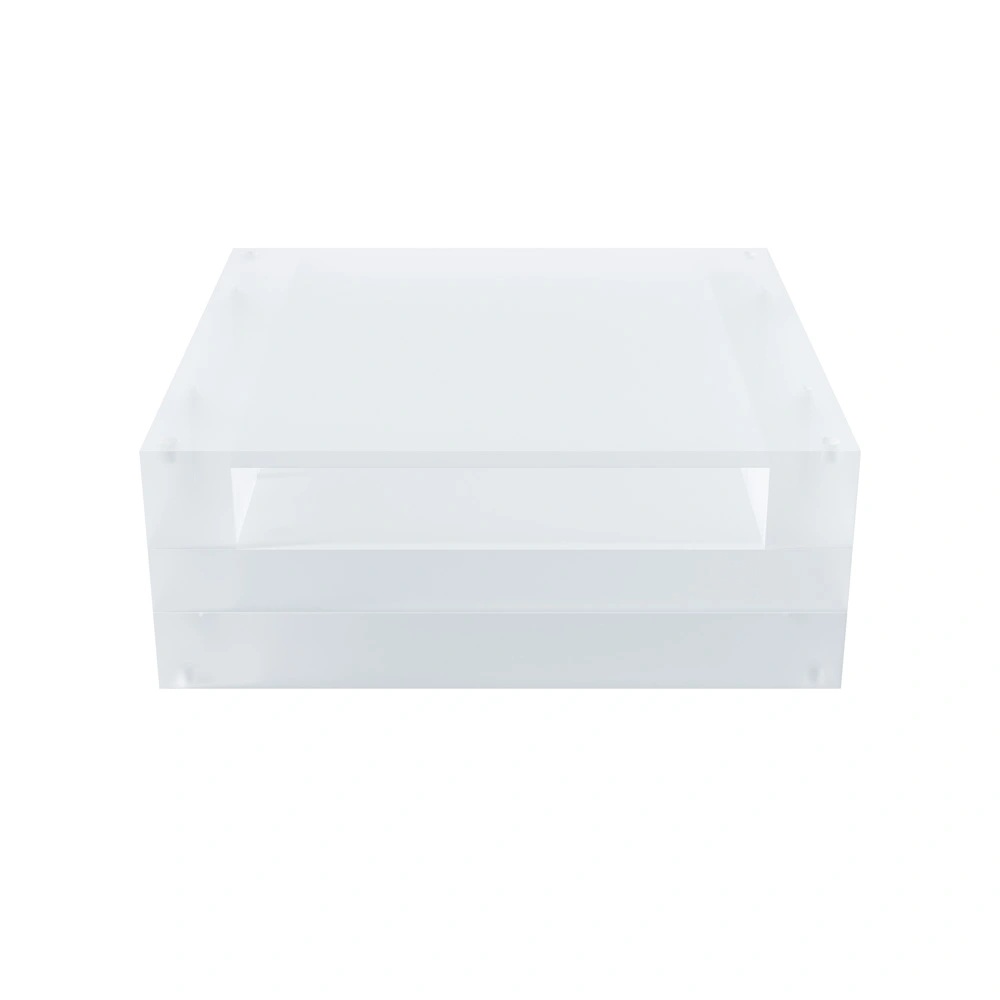 A square block made of transparent sanded plastic with a hole to fit other modules.