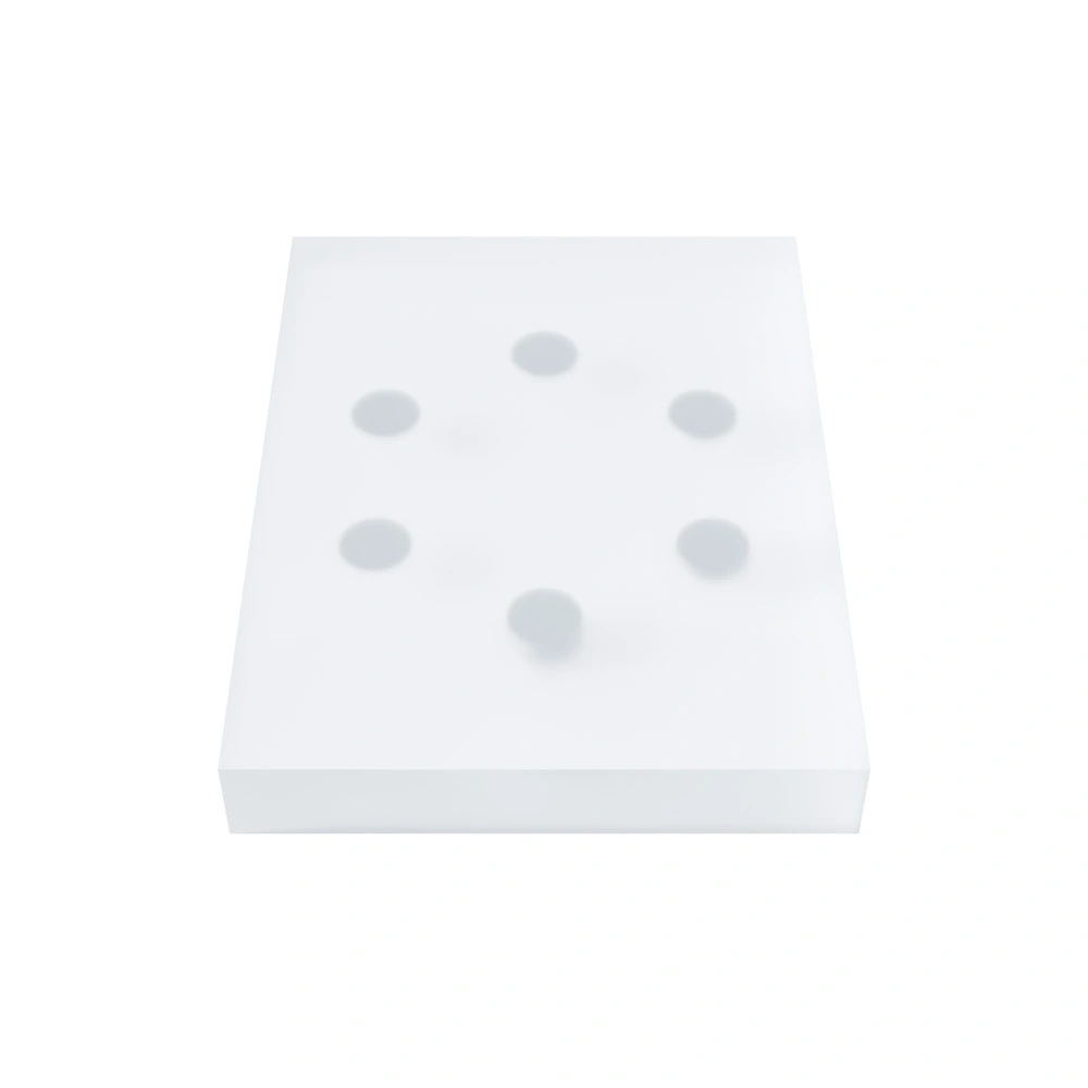 A rectangular block made of sanded transparent plastic.